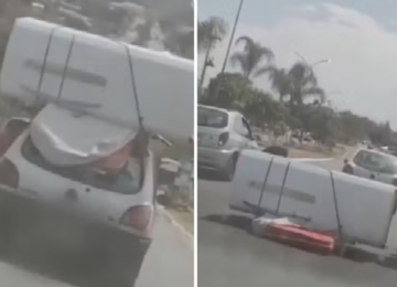 Geladeira e colchão caem de carro e bloqueiam avenida em Trindade