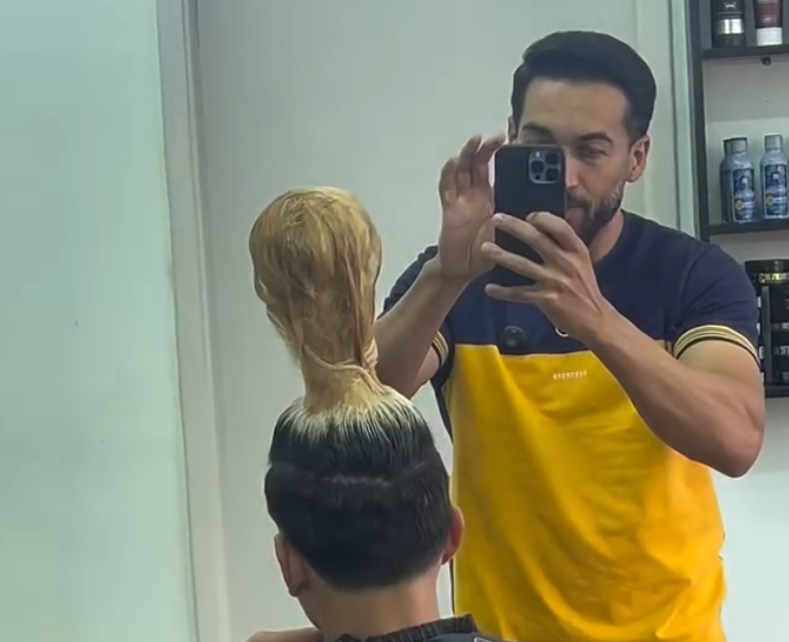 Barbeiro viraliza ao criar cortes de cabelo em formato de estádio