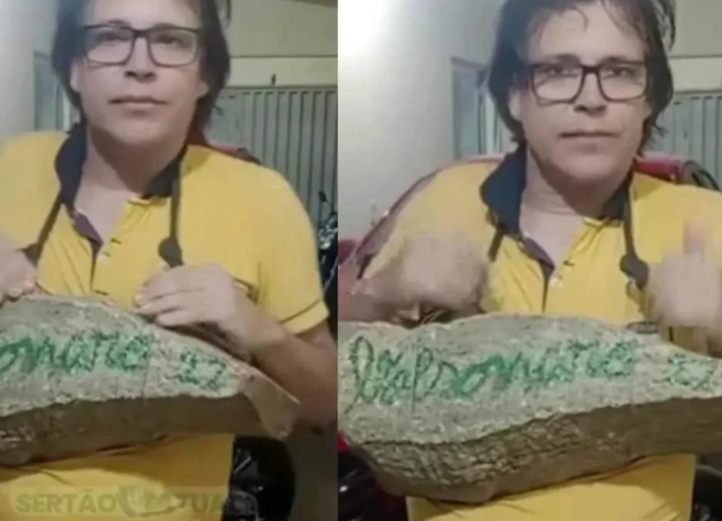 Homem aparece com pedra de 25 kg no pescoço e diz que fará sacrifício em apoio a caminhada até Brasília