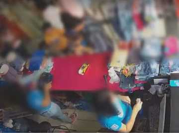 Câmera registra vendedora colocando dinheiro do caixa no bolso em loja de Goiânia
