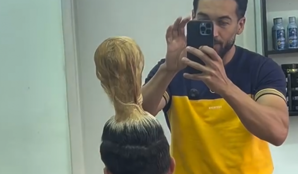 Barbeiro viraliza ao criar cortes de cabelo em formato de estádio