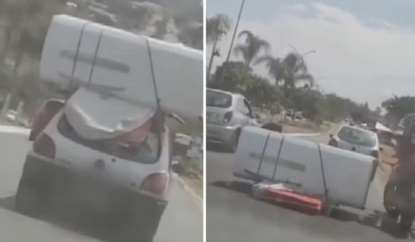 Geladeira e colchão caem de carro e bloqueiam avenida em Trindade